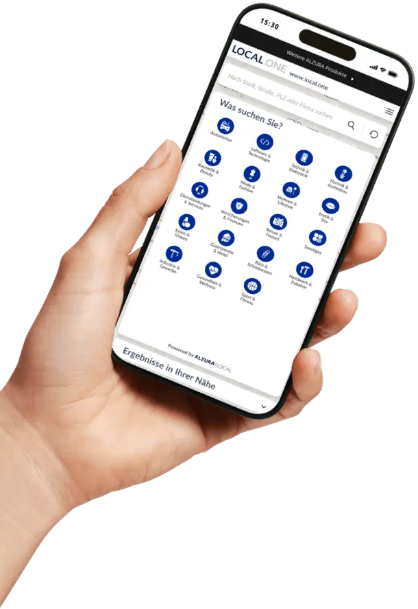 Dłoń trzyma smartfon z paskiem wyszukiwania i ikonami różnych branż na wyświetlaczu, aby szybko znaleźć i wybrać firmy.